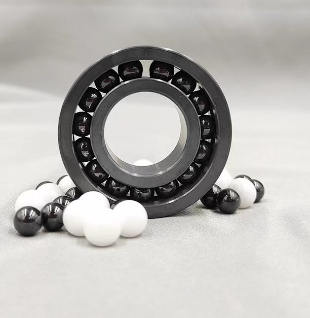 Silicon nitride hybrid ball bearing with ceramic balls